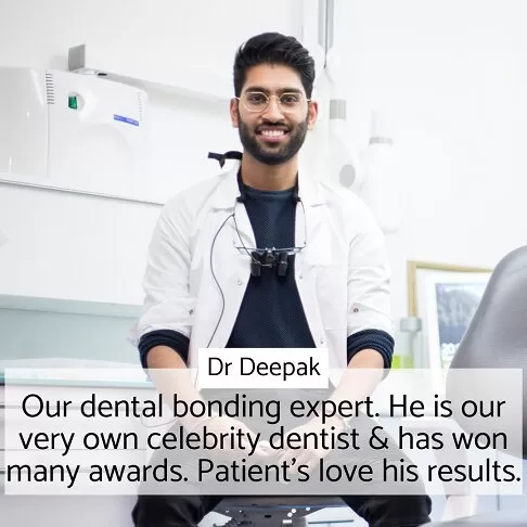 Dr. Deepak, Dentist Paddington’s bonding specialist, smiling while seated in a dental office, renowned for his expertise